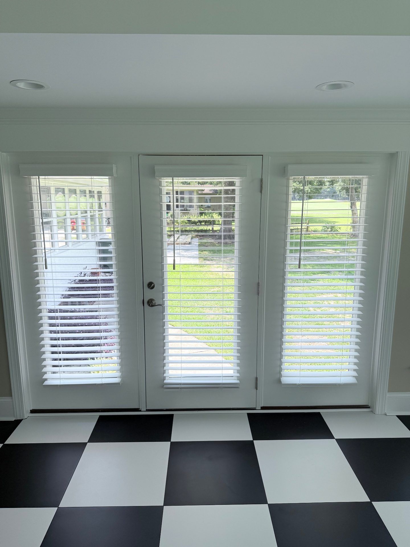 White Faux Wood Blinds on a Doot