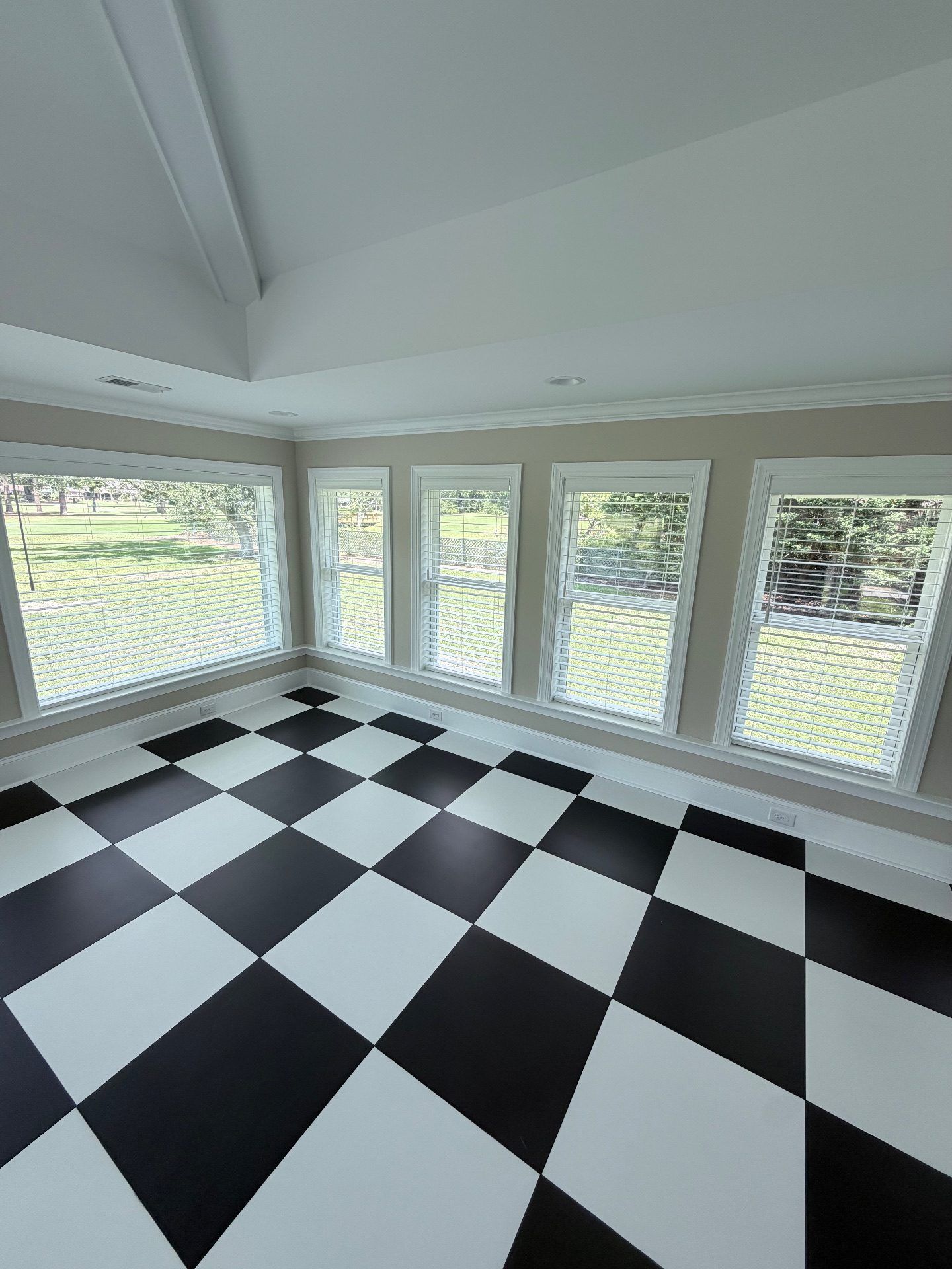 Faux Wood Blinds in a room with checkered floor