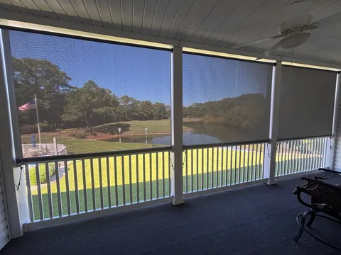 3% Screen Shades on a Patio with a view of a golf course