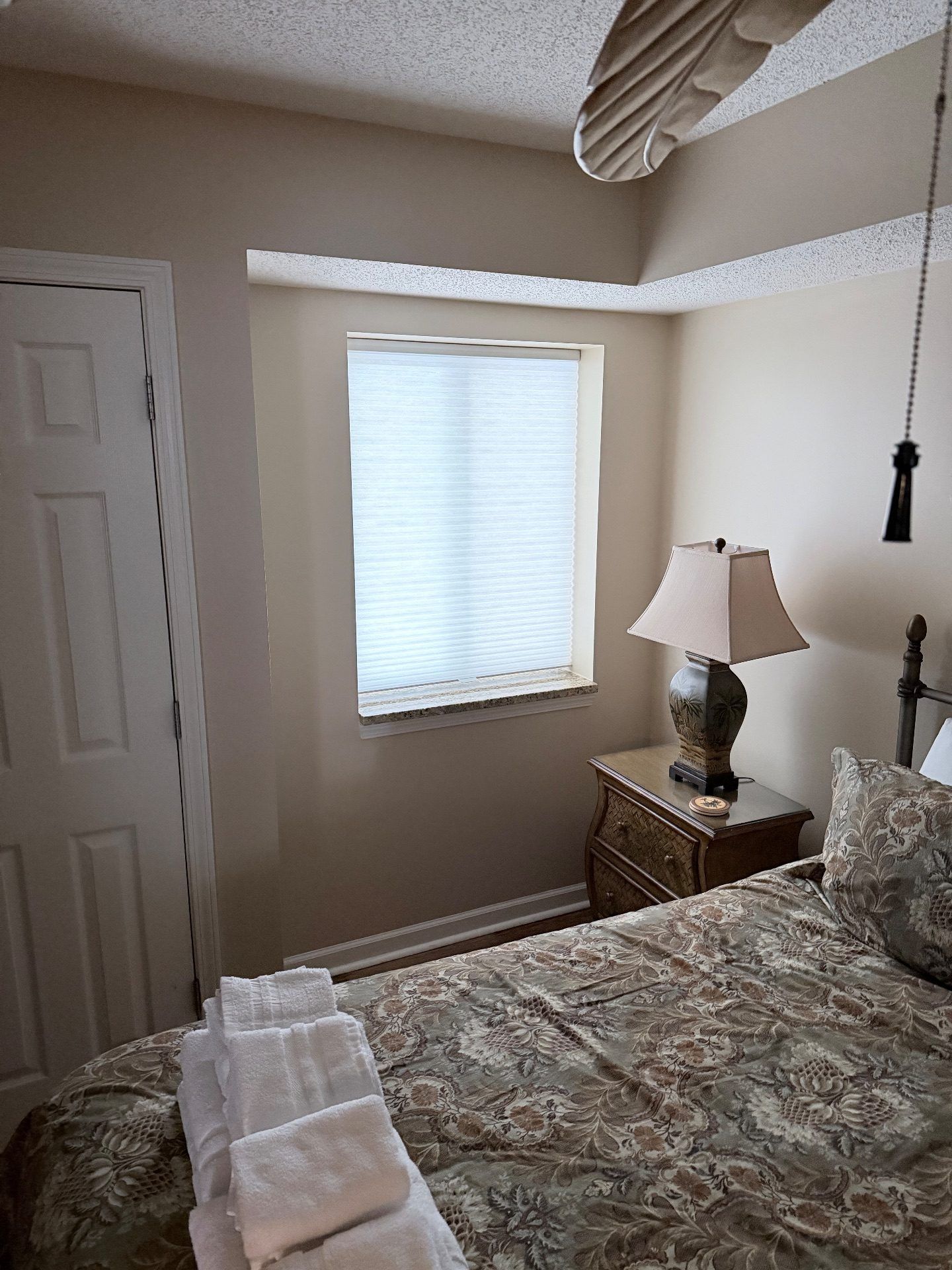 Cordless Honeycomb Shade in a condo bedroom