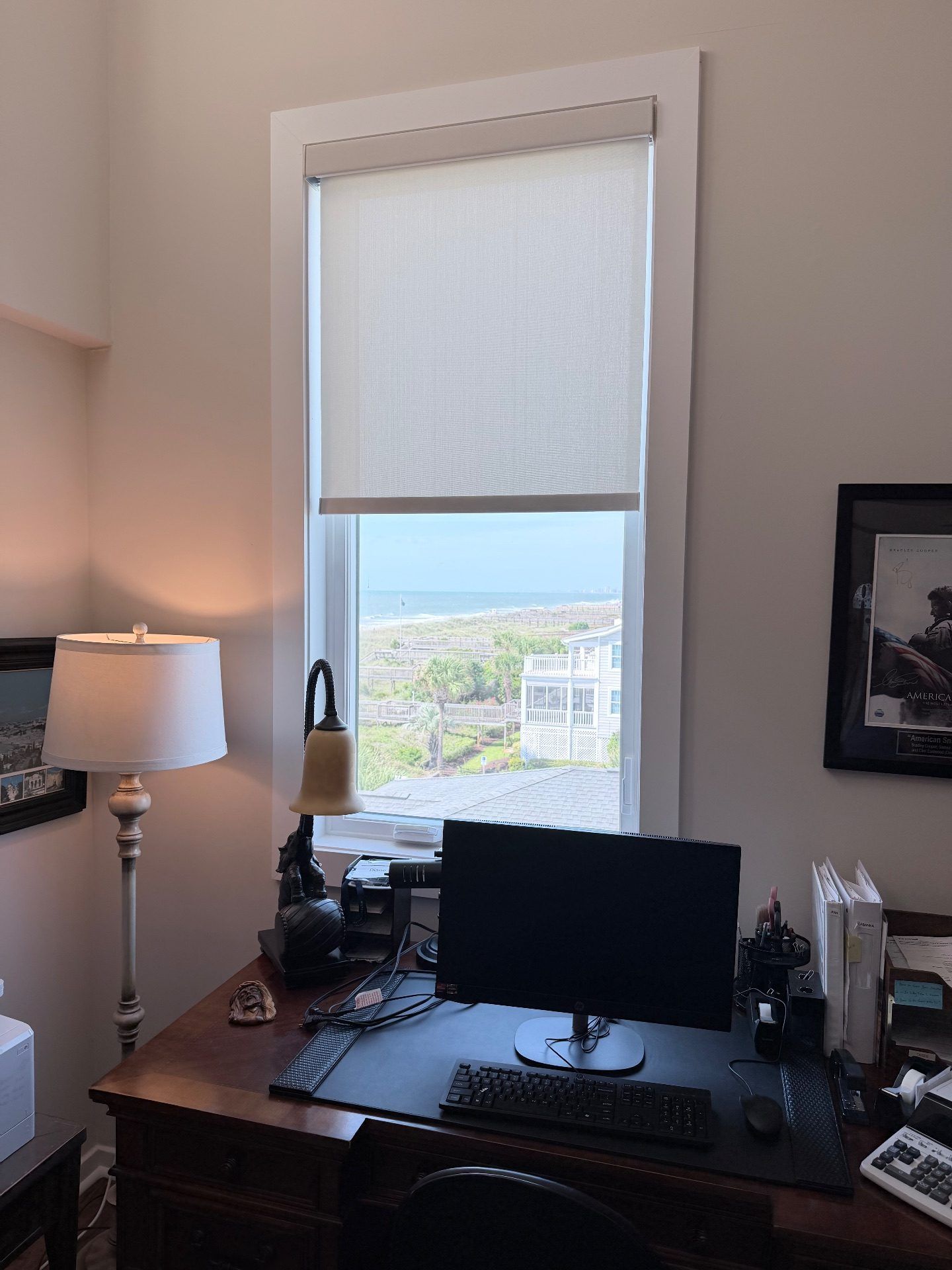PowerView Roller Shade in an Office with a Beach View