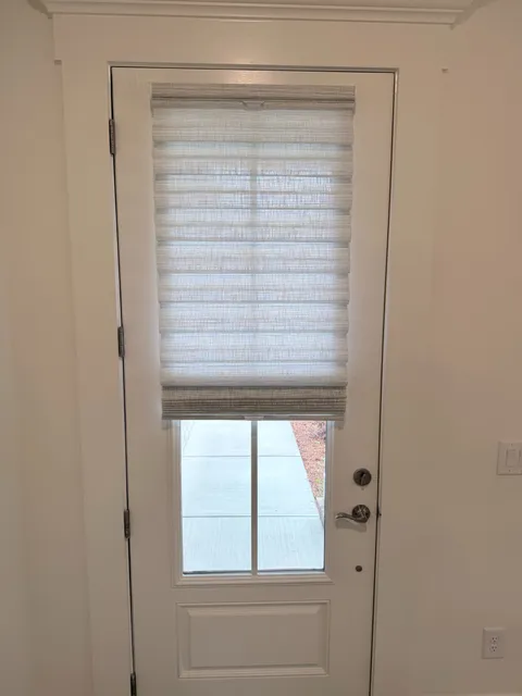 LiteRise Vignette Modern Roman Shade on a Door