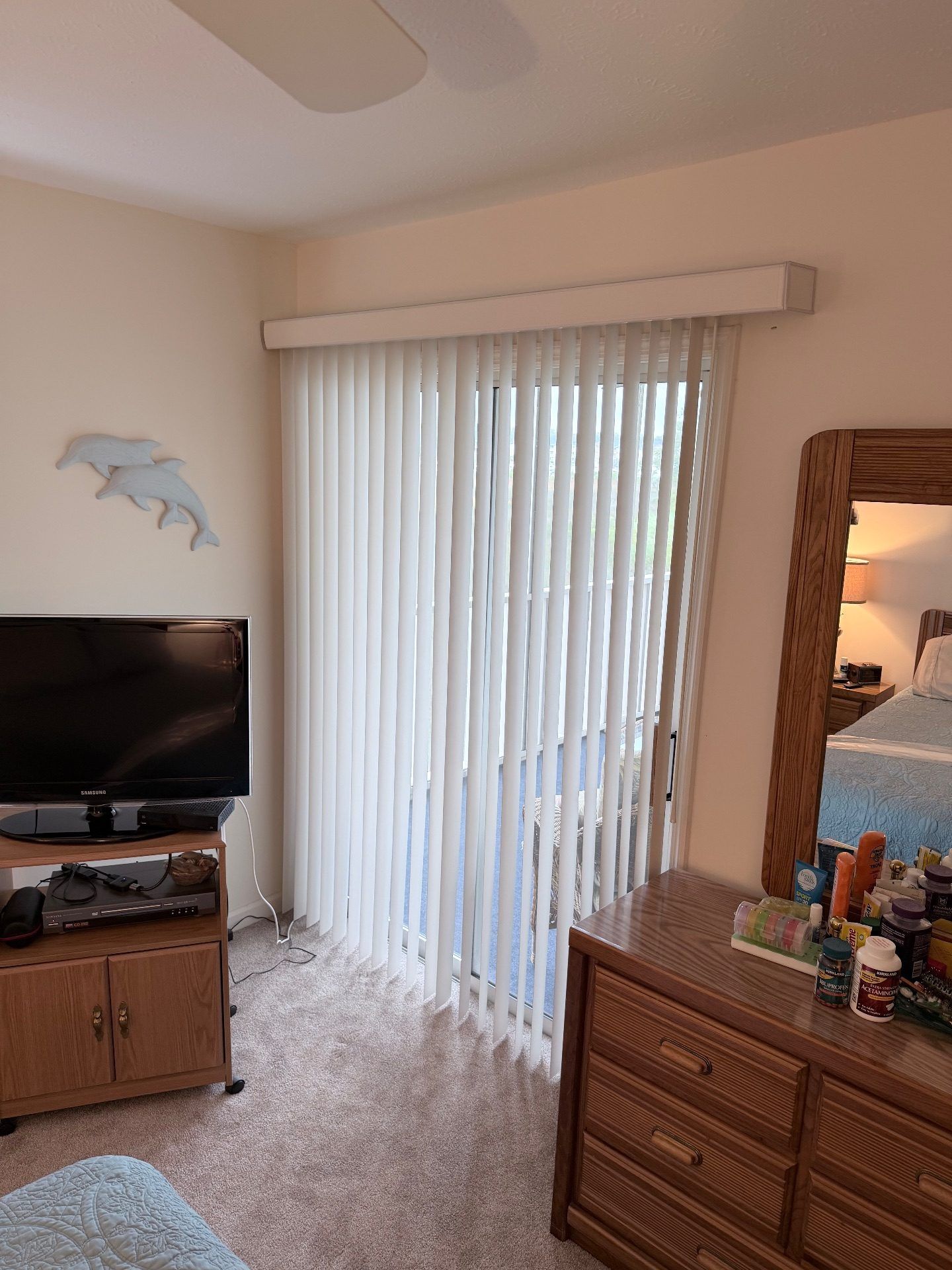 Vertical Blinds over a Bedroom Sliding Door