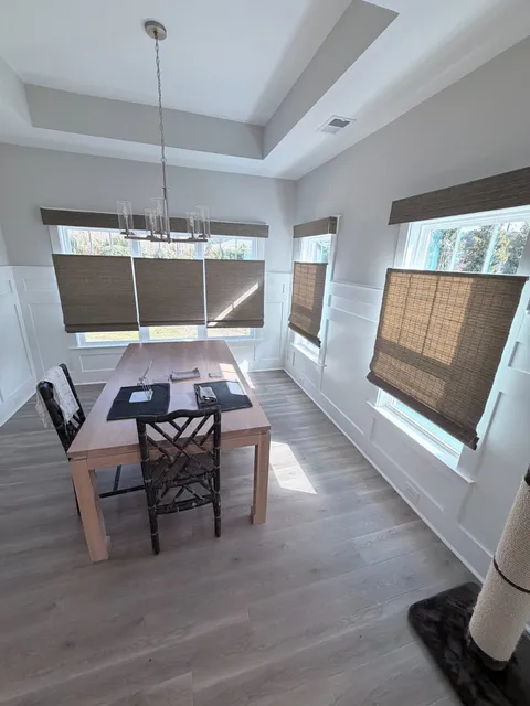 Hunter Douglas Provenance Woven Wood Shades with Top-Down/Bottom-Up Feature in a dining room
