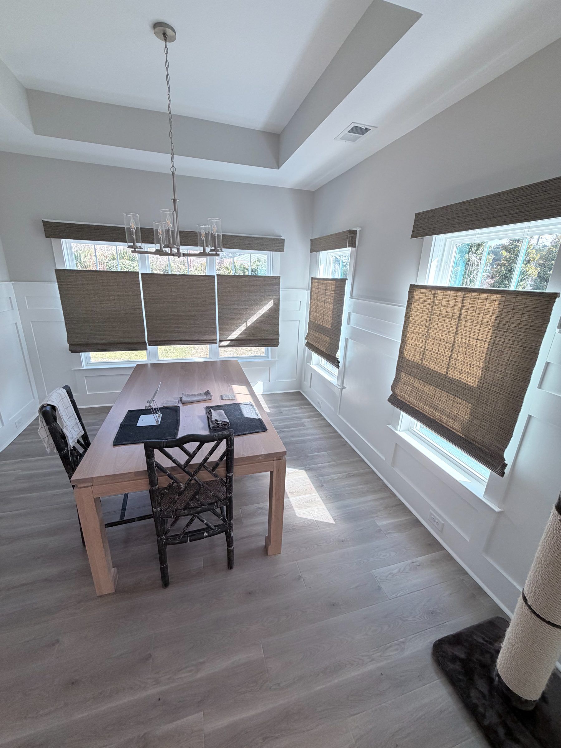 Hunter Douglas Provenance Woven Wood Shades with Top-Down/Bottom-Up Feature in a dining room