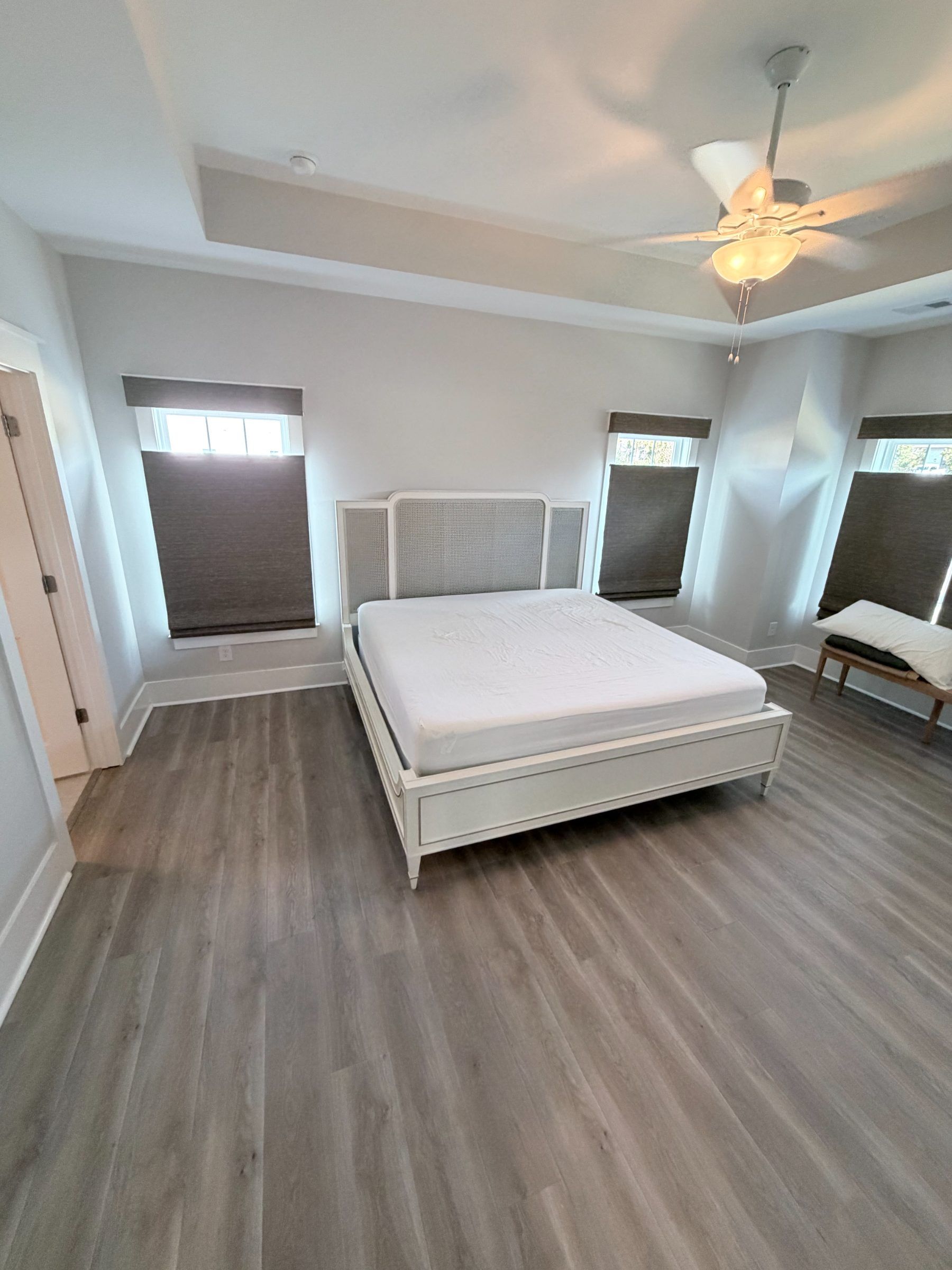 Hunter Douglas Provenance Woven Wood Shades with Top-Down/Bottom-Up Feature in a primary bedroom