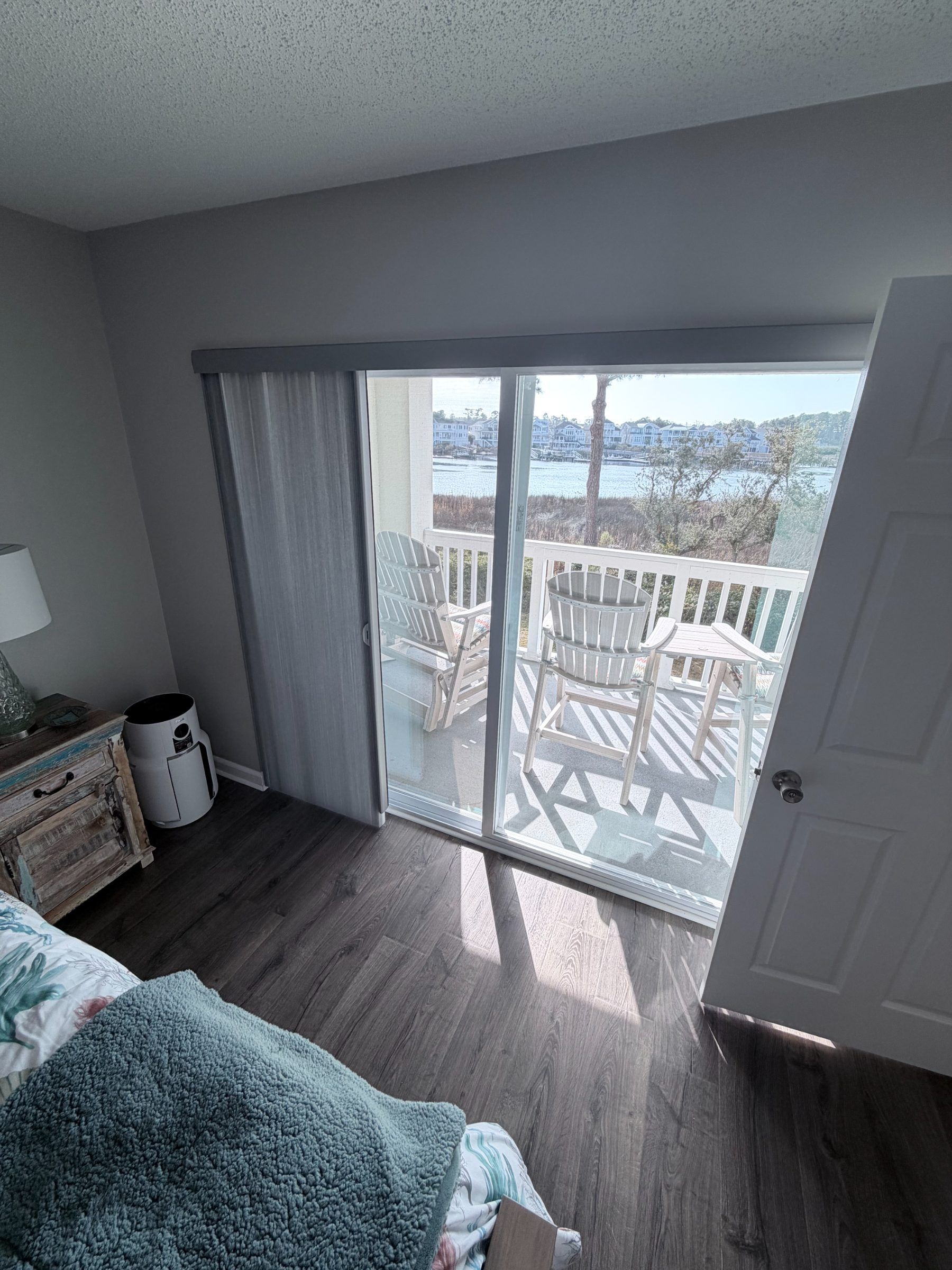 Gray Vertical Honeycomb over sliding glass door
